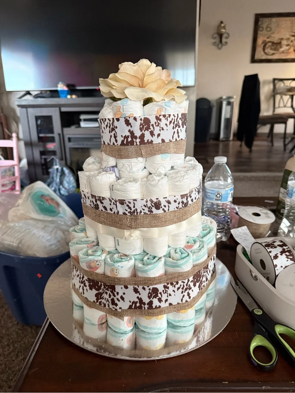 Woodland Baby Shower Diaper Cake with Purple Ribbon and Floral Accents